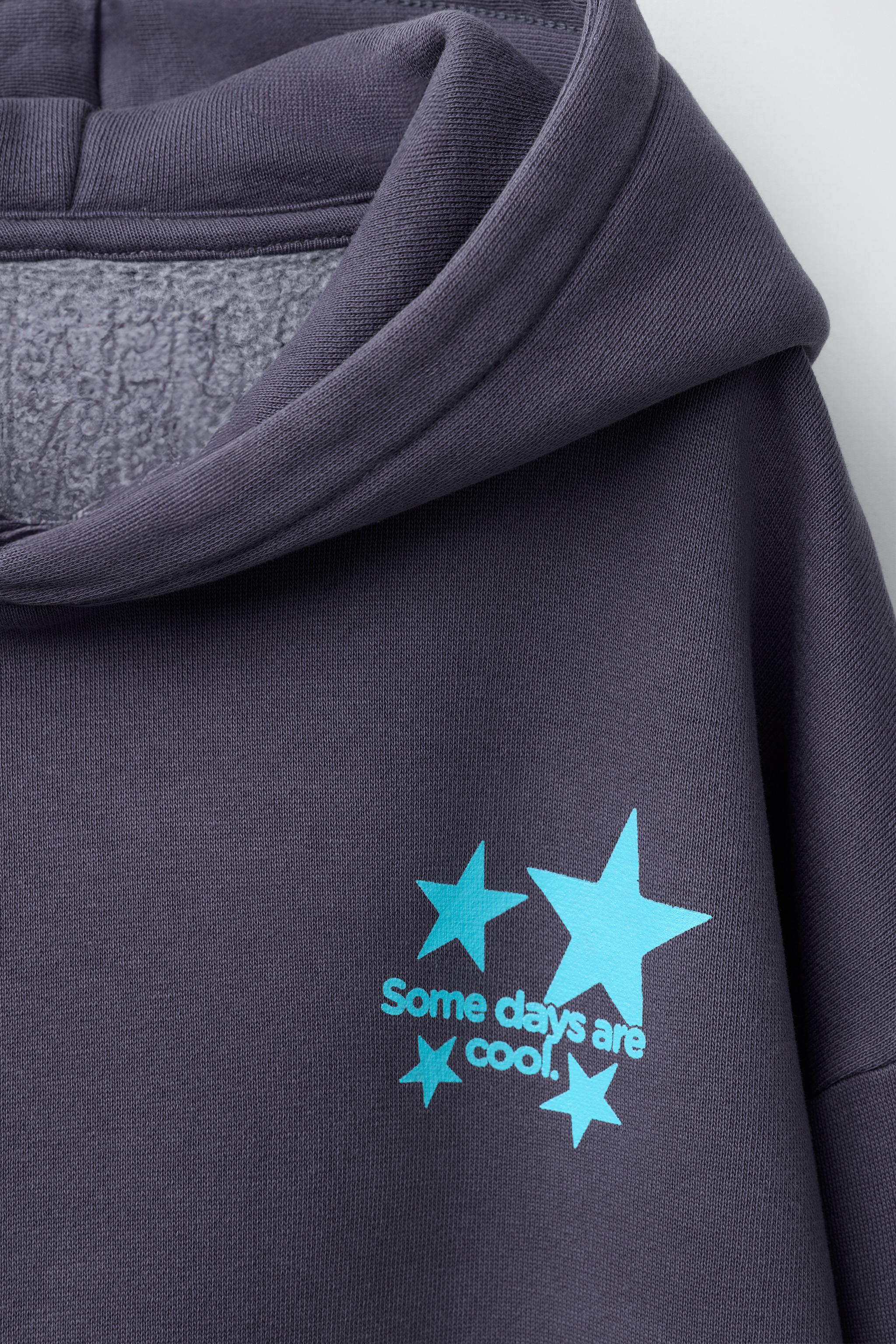 SWEAT À CAPUCHE IMPRIMÉ ÉTOILE